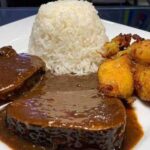 Asado negro y bollo pelón, cocina mantuana en la mesa de hoy